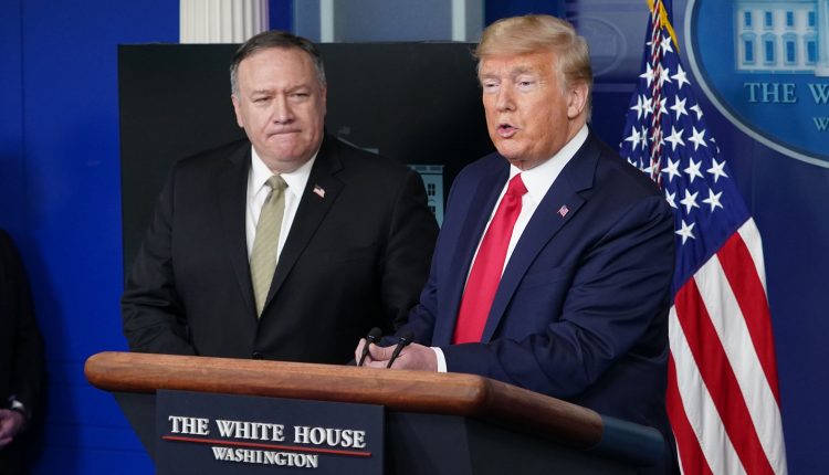 Trump contradicts Pompeo, plays down alleged Russian role in hack