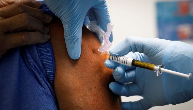 Side effects are signs shot is building protection, says ex-FDA chief