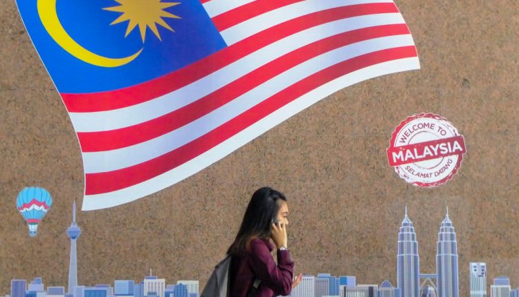 Economists cut forecasts for Malaysia’s 2021 growth on Covid lockdown