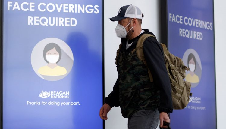 Scientists push Biden administration to require N95 masks in high-risk workplaces