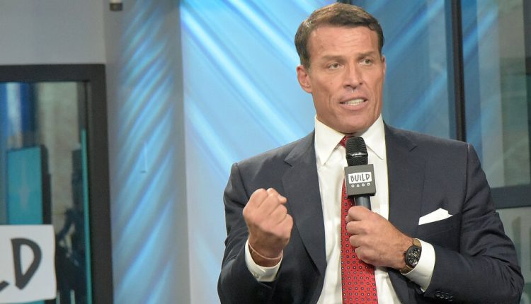 Lawsuit Accuses Tony Robbins of Discriminating Against Employee Who Got Covid