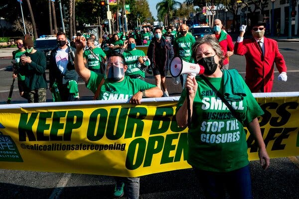 Small business owners protest in Los Angeles on December 12th.  Congress provided $ 285 billion in additional credit to help small businesses.