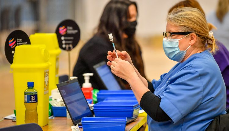 Economy could open up by late spring if enough people get vaccinated, says Dr. Ashish Jha