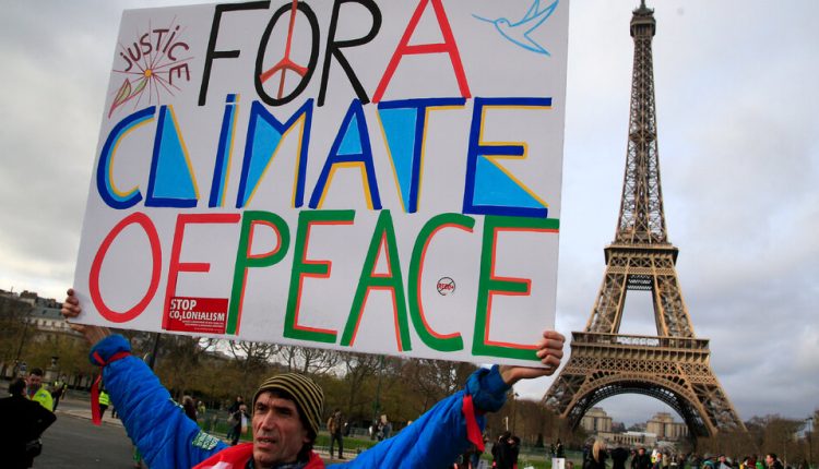 Biden, in a Burst of Climate Orders, Rejoins the Paris Agreement