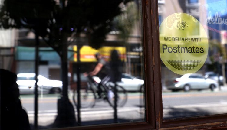 Uber, After Buying Postmates, Lays Off More Than 180 Employees