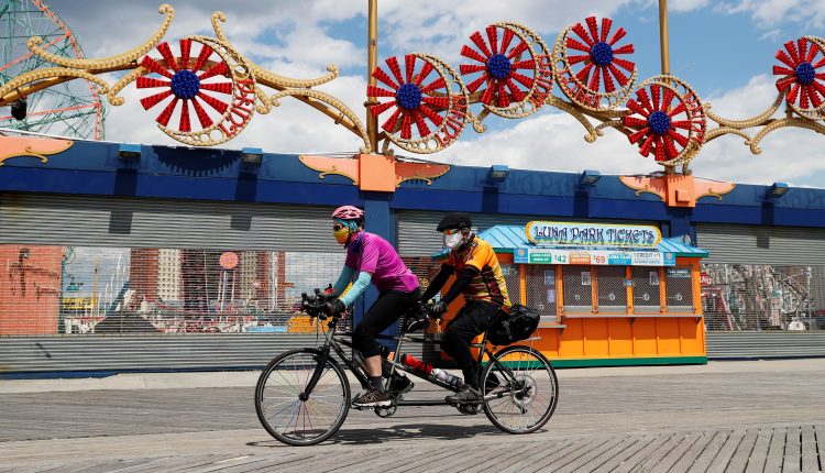 New York's Cuomo says amusement parks, summer camps can reopen
