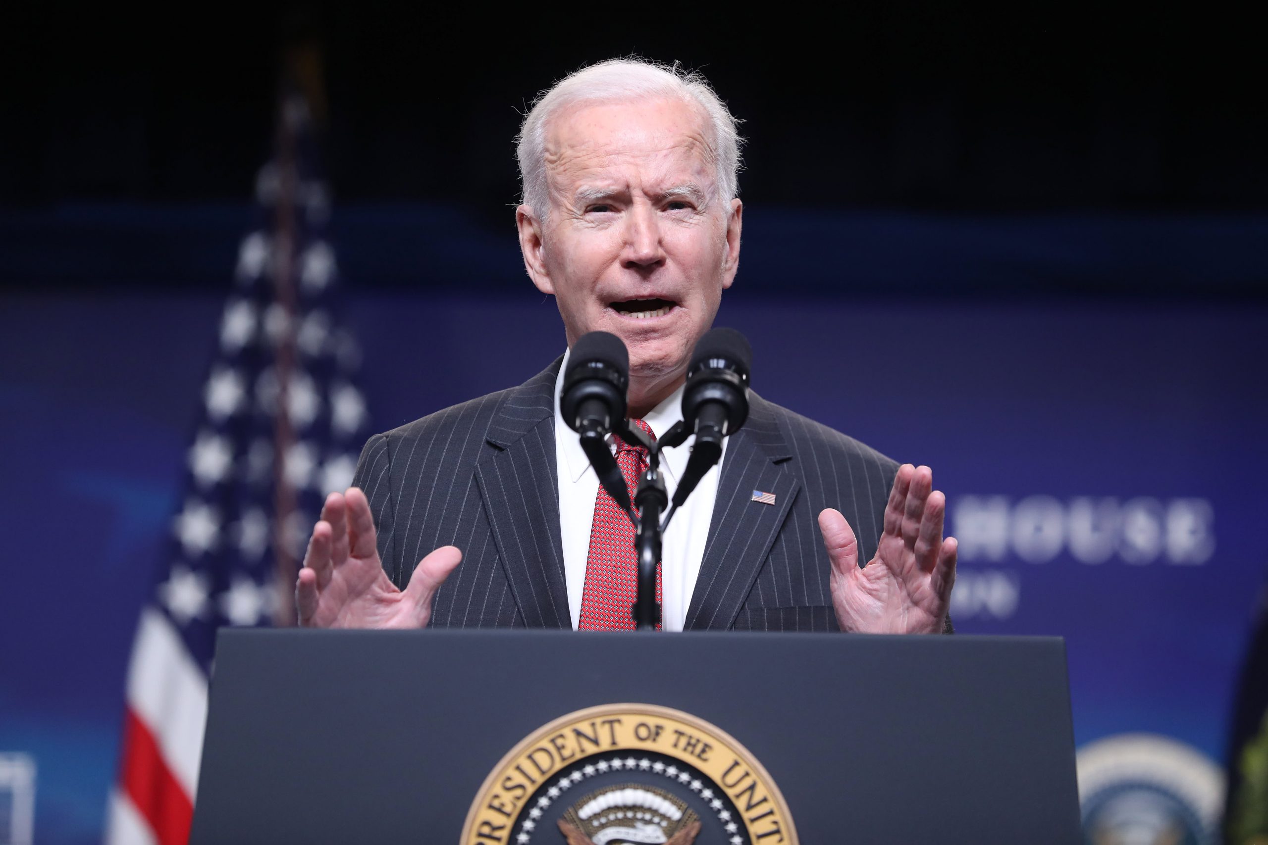 Biden speaks at Pfizer vaccine manufacturing site as storm delays shipments