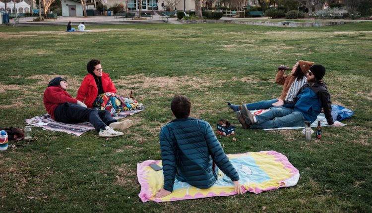 Vaccinated Americans, Let the Unmasked Gatherings Begin (but Start Small)