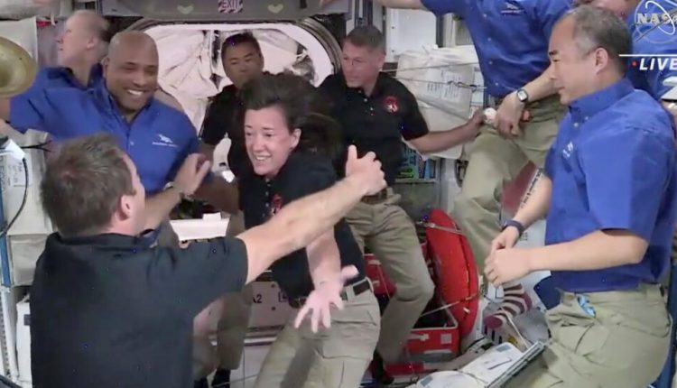 4 Astronauts Float Into the International Space Station and Open Arms